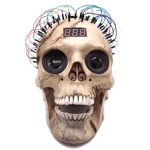 WIRED HAND CARVED WOOD SKULL ART DECORATION