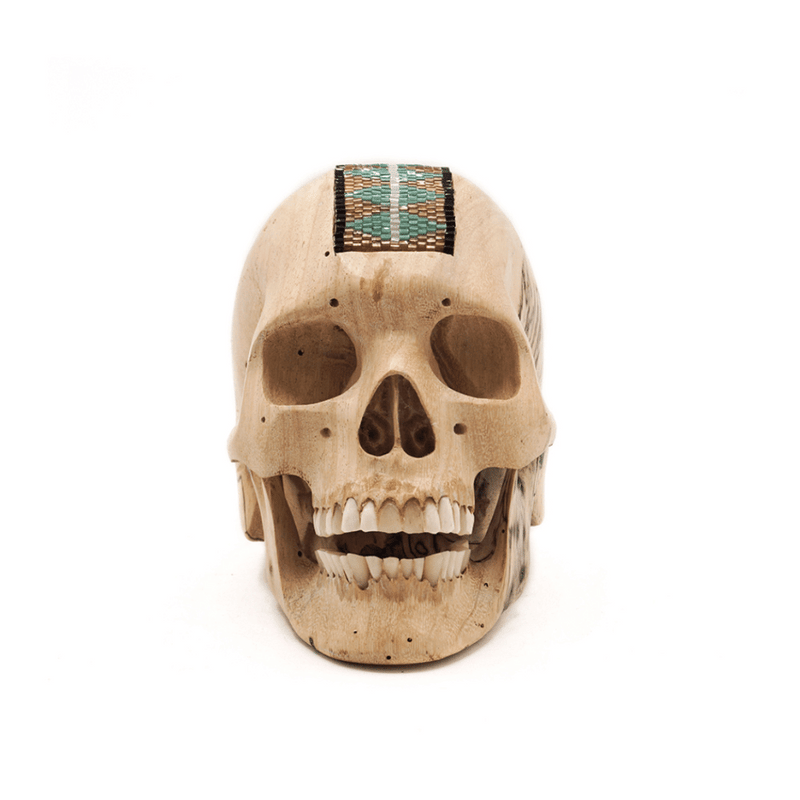 WOOD SKULL WITH HAND CRAFTED BEADED DETAIL